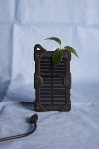 home solar batter with plant on top